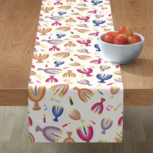 table runner with colorful hanukkah menorahs